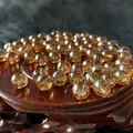 Amber translucent round beads for DIY jewelry with center hole and polished finish - 4mm (Aperture approx 1mm, 100 Pieces/Pack) / Champagne