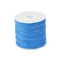 Elastic beaded blue nylon string for DIY bracelets and jewelry making on white spool - Light Blue Flat Elastic Thread