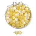 Macro detail of yellow cat eye resin beads for DIY jewelry with silky gradient shine - Amber White / Approx 8mm (20 Pcs/Pack)