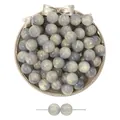 Perles en résine bleu-gris effet marbré pour création bijoux sur plateau doré - Gris