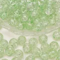 Perle di vetro tonde verde chiaro con effetto crackle per creazione gioielli - Diametro 10mm (10 Pezzi/Confezione) / Verde chiaro
