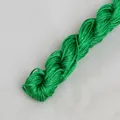 Heldergroen gevlochten koord voor DIY-sieraden met gladde zijden textuur en glanzende afwerking - Groen