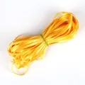 Bright yellow satin ribbon roll with silk finish for DIY handmade crafts and gift wrapping - Orange