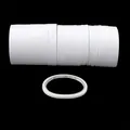Macro shot of white high-viscosity double-sided tape rolls on a black background - Narrow Width