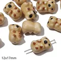 Detail van 12x17mm panda poot keramische kralen met gepolijste afwerking voor DIY sieraden - Beer / 1 Stuk/Pak (12x17mm) / Bruin