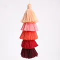 Five-layer gradient tassel pendant in warm tones from light apricot to deep burgundy - Orange Pink Red Gradient