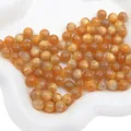 Perles rondes en pierre de soleil dorée avec effet œil de chat pour fabrication de bijoux - Kaki