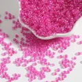 Bulk iridescent transparent pink glass seed beads for DIY jewelry and bracelet making - Rose Red