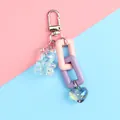 Llavero de oso iridiscente con cadena de colores sobre fondo pastel decorativo - Estilo de Tema Púrpura y Rosa-Púrpura (a5040-1)