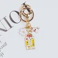 Dettaglio portachiavi in stile giapponese con ciliegio e amuleto omamori portafortuna - A5041-3