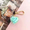 Preserved mint green rose keychain in heart acrylic pendant with golden clasp - Green