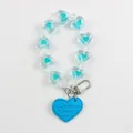 Macro detail of sky blue heart-shaped beaded keychain with metallic spring clasp - Blue (a5059-4)