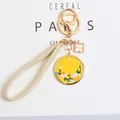 Close-up of yellow floral daisy embroidery keychain with gold metal buckle and pendant - Small Daisy Round Plate (a5076-2) / Yellow