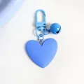 Detail of light blue heart-shaped keychain with matching bell and matte finish spring hook - Light Blue (a5098-1)
