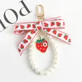 Detail of strawberry charm keychain with white pearl loop and embroidered ribbon bow - 5120-3 (Bowknot Pearl Loop Style)