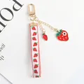 Detail of strawberry keychain with printed ribbon and crystal studded fruit charm - 5120-2 (Long Ribbon Pendant Style)