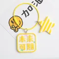 Macro detail of yellow square acrylic keychain with star charm and bead on steel ring - Bright Future Style(5130-4) / Yellow
