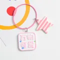 Close-up of pink star and square tag pendant on a steel wire keychain for bags - All Things Cute Style(5130-2) / Pink