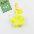 Detail of yellow plush flower keychain with heart tag and acrylic chain links - Yellow (5179-4)