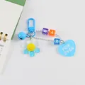 Porte-clés tournesol bleu en acrylique avec smiley, perles de lettres et breloque coeur - Charme Anneau en D Bleu (5185-1) / Bleu