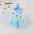 Details des blauen Plüsch-Monster-Schlüsselanhängers mit Stickerei, Glocke und Blume - Blau