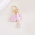 Detail of pink pearlescent cloud keychain with gold clasp and white pearl drop charm - Cherry Pink (5200-4)