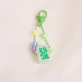 Green glitter Mahjong Fa charm with heart clasp and colorful beads keychain accessory - Green Fa Character Glitter Heart Clasp Style / Green