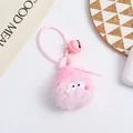 Close-up of pink fluffy monster keychain with soft gel ring and bell accessory - Pink Style (5216-7)