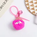 Macro detail of pink plush keychain with knit hat, cute eyes, and pink bell ornament - Rose Red Style (5216-2)