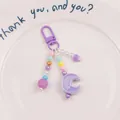 Detail of purple moon and heart beaded keychain with iridescent beads and lobster clasp - Purple (yc5230-3)