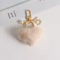 Apricot heart plush keychain with gold number 5 charm and pearl bead for bags - Apricot