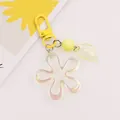 Macro detail of iridescent acrylic flower keychain with yellow leaf and matte bead charm - Bright Yellow (yc5231-3)