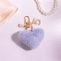 Light purple plush heart keychain with pearl number 5 charm and gold carabiner - Blue