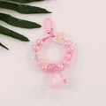 Detail view of pink milk tea keychain with beaded letters and acrylic charms - Pink (S)