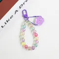 Detail of colorful gradient beads keychain featuring a purple acrylic cat paw charm and hook - Cat Paw