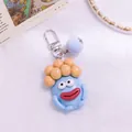 Detail of blue cartoon monster keychain with orange hair and soft plush pompom accessory - Blue (yc5288-3)