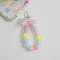 Pink bow keychain with macaron colored beads and a silver metal spring clip - Pink