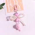 Close-up of heart lollipop keychain with pearl bow and pink lobster clasp detail - Pink Bow Style(yc5294-1)