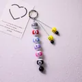 Detailed view of colorful billiard ball bead keychain with smiley charms and woven cord - Smiley Beaded Pendant (yc5317-Smiley Beaded)