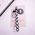 Detail of checkered wrist strap keychain with daisy floral pendant and black bell charm - White Five-Petal Flower (yc5305-1)