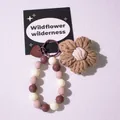 Detail of beaded keychain with large wool flower and brown heart charm on white background - Dark Coffee