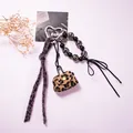 Detailed leopard print charm set with heart clasp, plush strap, and mini pouch - Light Coffee Leopard