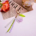 Elegante portachiavi con rosa in resina viola, perline colorate e chiusura a moschettone oro - Viola