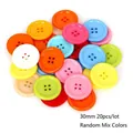 Detail view of 30mm colorful 4-hole round plastic buttons in a 20pcs random mixed color lot - Diameter 30mm x Thickness 4mm (20 Pieces/Pack) / Random Mixed Colors