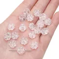 Translucent frosted clover glass beads for DIY jewelry making on human palm - Transparent White