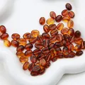 Barnsteenkleurige acryl koffieboon kralen met spiraalstructuur voor DIY sieraden - Barnsteen Rood Omrand