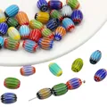 Ovale Millefiori-Glasperlen mit bunten Wellenstreifen für DIY-Schmuckherstellung - 10er Pack / 6x9mm Ovale Perle / Zufällige Mischfarben