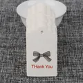 White cardstock thank you tags with a red bow design and elegant scalloped edge - White Scalloped Bow Style