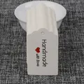 White scalloped cardstock tags with Handmade with love text and red heart icon - White Scalloped Handmade Style