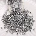 Polished silver glass seed beads for DIY jewelry making poured on a white plate - Style #04 / 10g/Pack (3mm) / Silver